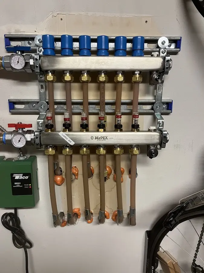 Plumber performing Water Heater Repair at a residential property in Bozeman